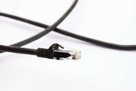 black internet cable isolated on whiteの写真素材