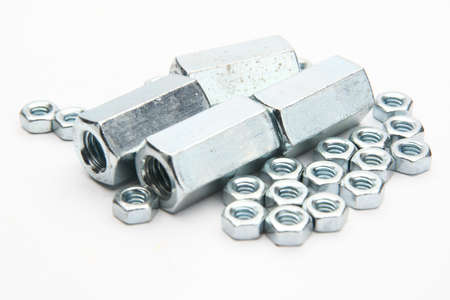 hexagon coupling nut and hexagon nut on white backgroundの写真素材
