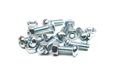 screw bolts attached to hex nuts isolated on whiteの写真素材