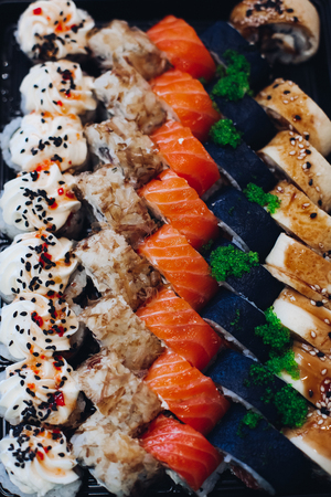 Above view of different and colorful delicious mouthwatering sushi set.の写真素材