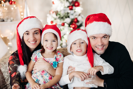 Beautiful happy caucasian family. Portrait of happy loving siblingsの写真素材