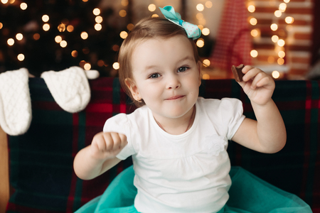 Cheerful little girl looking at camera, posing.の写真素材