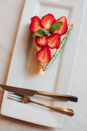 View from above of delicious cake with strawberriesの写真素材