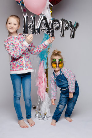Happy family posing while celebrating birthday party