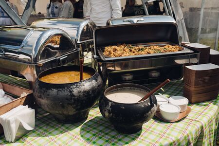 Close-up appetizing pilaf with gravy chicken beef serving for buffet food at luxury hotelの写真素材