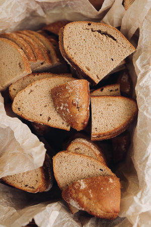 Freshly baked bread cut in a basket.