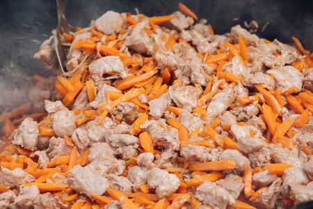 Process of cooking of delicious pilaf. Concept of cuisine and food.の写真素材