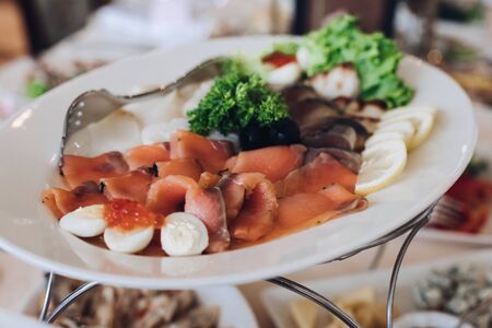 Fully-served banquet table at wedding. Wedding festive banquet.の写真素材