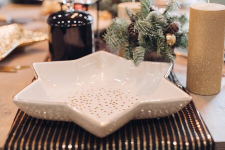 Close up of star-shaped plate on the festive tableの写真素材