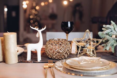 Christmas holiday dinner table for celebrating at homeの写真素材
