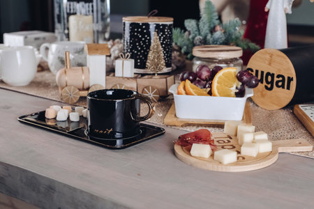Festive table with food and New Year decor