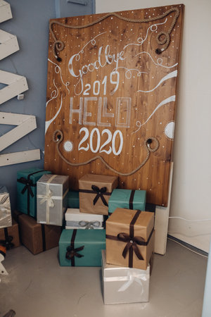 2020 New Year number on wooden background. Christmas holidays