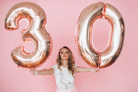 Pretty woman in summer clothes gave a lot of fun and celebrates her birthday, picture isolated on...
