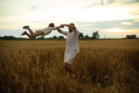 Young caucasian family with one child spend a lot of time together and have funの写真素材