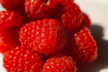 Beautiful raspberries isolated on a white background. Cut out, close up. Background and picture for postcardの写真素材