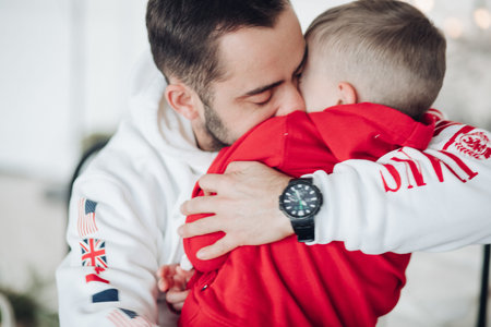 :Happy dad and children Portrait of smiling young family on Christmas day. Togetherness concept