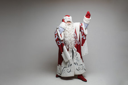 picture of old santa claus points to something upの写真素材