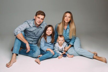 Beautiful Caucasian family with two children.の写真素材