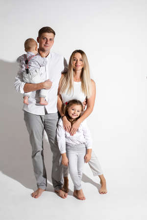 happy family smile together in the studioの写真素材