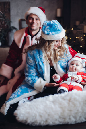 Family wearing traditional winter costumes.の写真素材