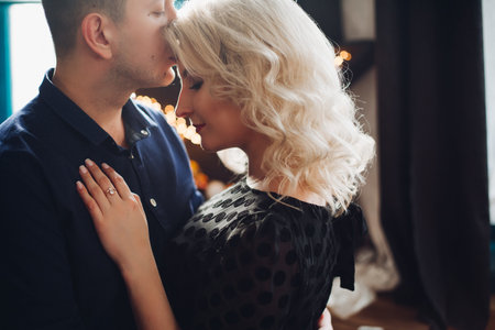 Portrait of sensual couple looking in the eye to each other.の写真素材