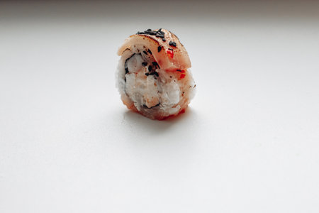 Beautiful delicious sushi. Sushi delivery. Advertising sushi rolls made of fish and cheese.の写真素材