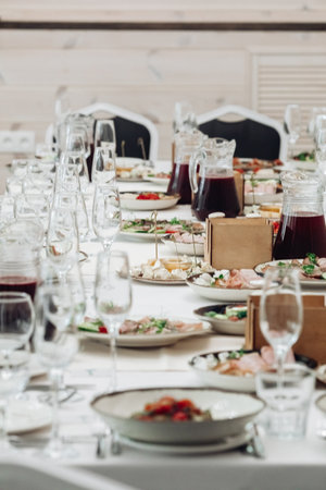 restaurant table setting, banquet, dishes are on the tableの写真素材