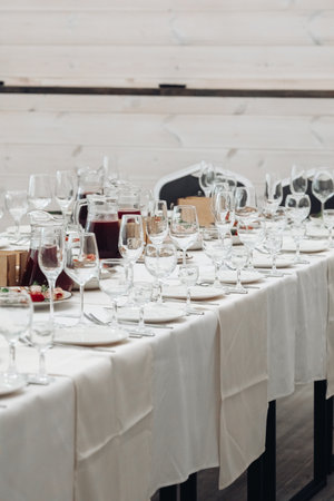 restaurant table setting, banquet, dishes are on the tableの写真素材