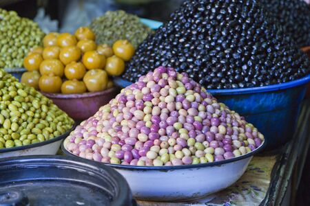 different types of olives being sold at Marrakech marketの写真素材