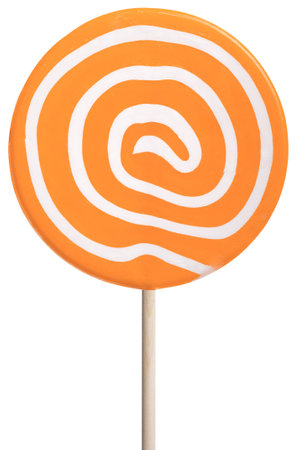 Round lollipop with orange and white swirls isolated on white.の写真素材
