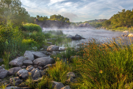 The river South Buh is at dawn in fog.の写真素材