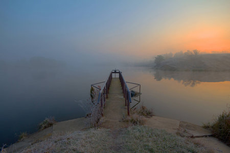 Lake at dawn by a frosty morning.の写真素材