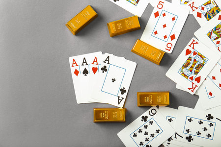 Blackjack 21 hand of a King and an Ace playing Cards on felt with chips and gold