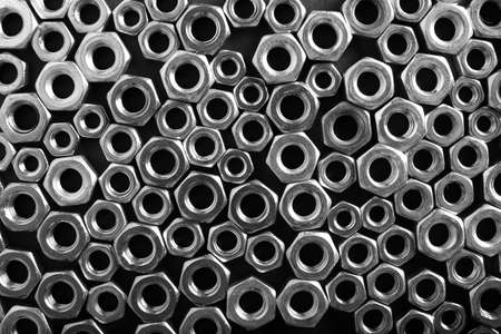 Wheel nuts on a dark background top view. Template, blank for design for dad's dayの写真素材