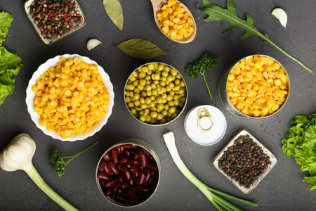 Canned corn, beans and peas in a jar top view. Canned legumes