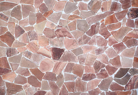 Stone background from shards of red marble. Abstract stone background.の写真素材