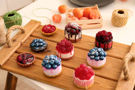 Cold Processed Handcrafted Soap. Homemade soap look like cake with berries on light background. Natural homemade cosmetics and handmade soaps concept.の写真素材