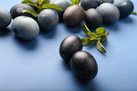 Blue eggs on a blue background. Easter concept. Coloring with hibiscus. Natural dyes, preparation...