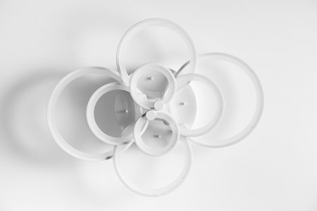 Modern LED white ring lamp on the ceiling. bottom view.の写真素材