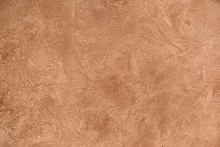Brown abstract background with place for text, texture pearl brown background for design, text, advertising, decorative plaster texture for walls.の写真素材