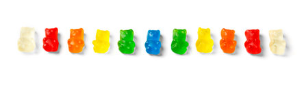 Jelly candies gummy bears of different colors on a white background, colorful fruity marmalade.の写真素材
