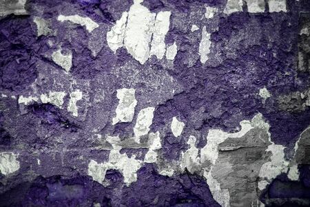 bricksold brick wall with remnants of clay. Background,worn textureの写真素材