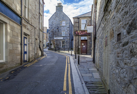 Lerwick, Shetland, Scotland, United Kingdom. Street View of the old city of 400 years (17th century) with its characteristic granite houses in northern Europe.のeditorial素材