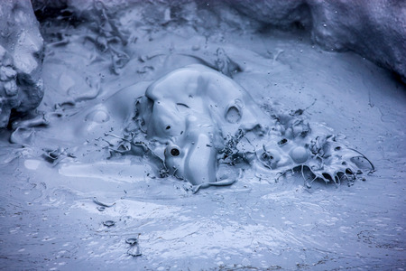 Hot boiling mud from volcanic activity in geothermal region of Hverir in Iceland near Myvatn Lake,の写真素材