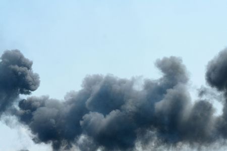 black smoke from explosionの写真素材