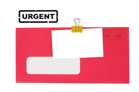 red envelope with blank business card, and urgent stampの写真素材