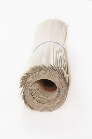 a roll of newspaper, concept of news mediaの写真素材