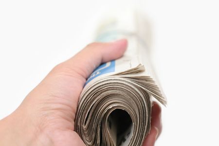 a roll of newspaper, concept of news mediaの写真素材