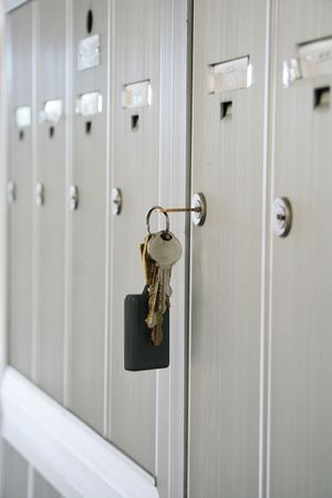 Silver-tone  mailbox and keyの写真素材