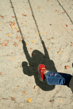 Girl on a swing at playground